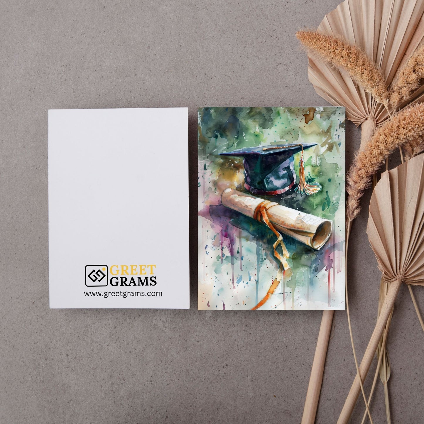 Graduation Card showing certificate and graduation cap in painting
