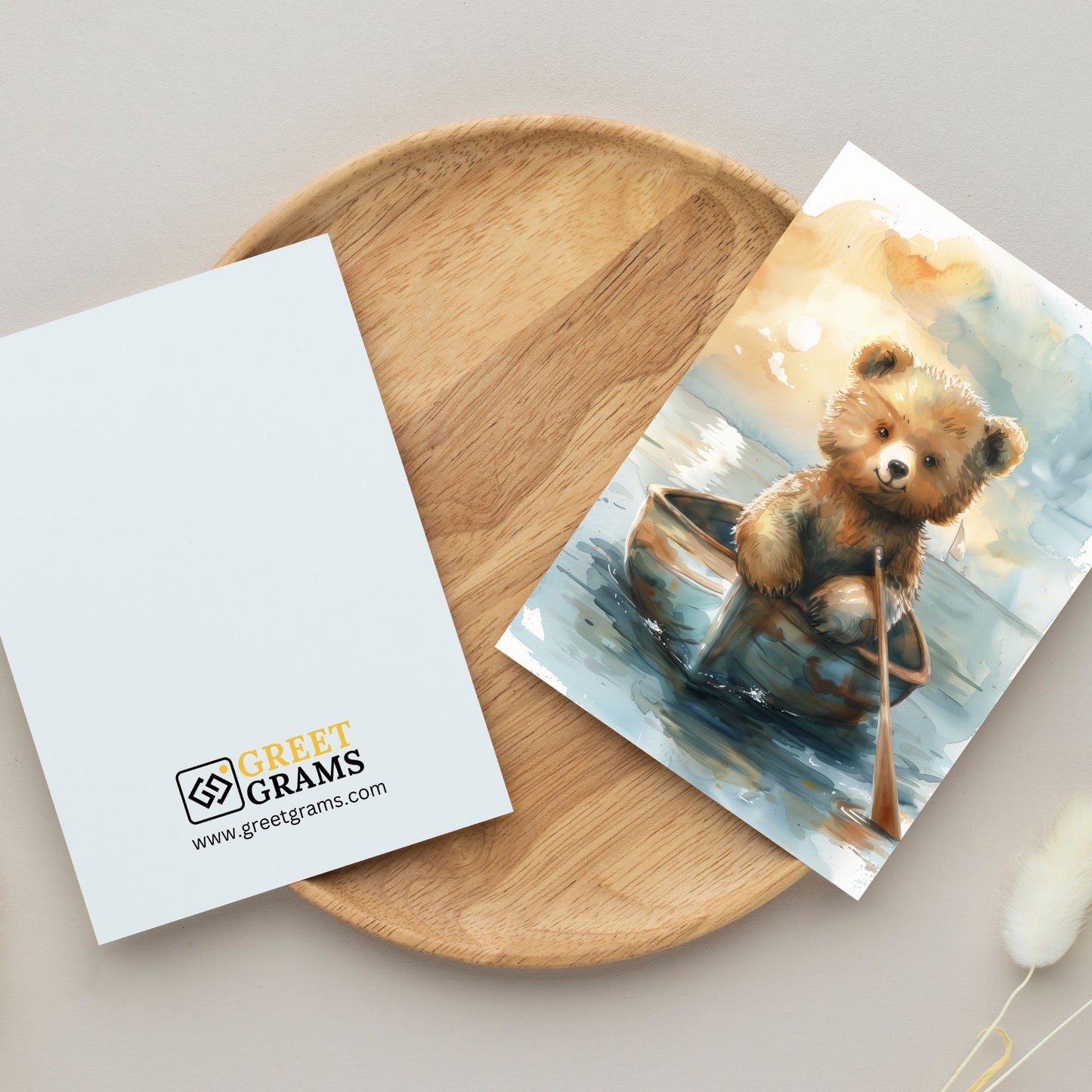 greeting card of a  bear enjoying the seaside retreat in grey background