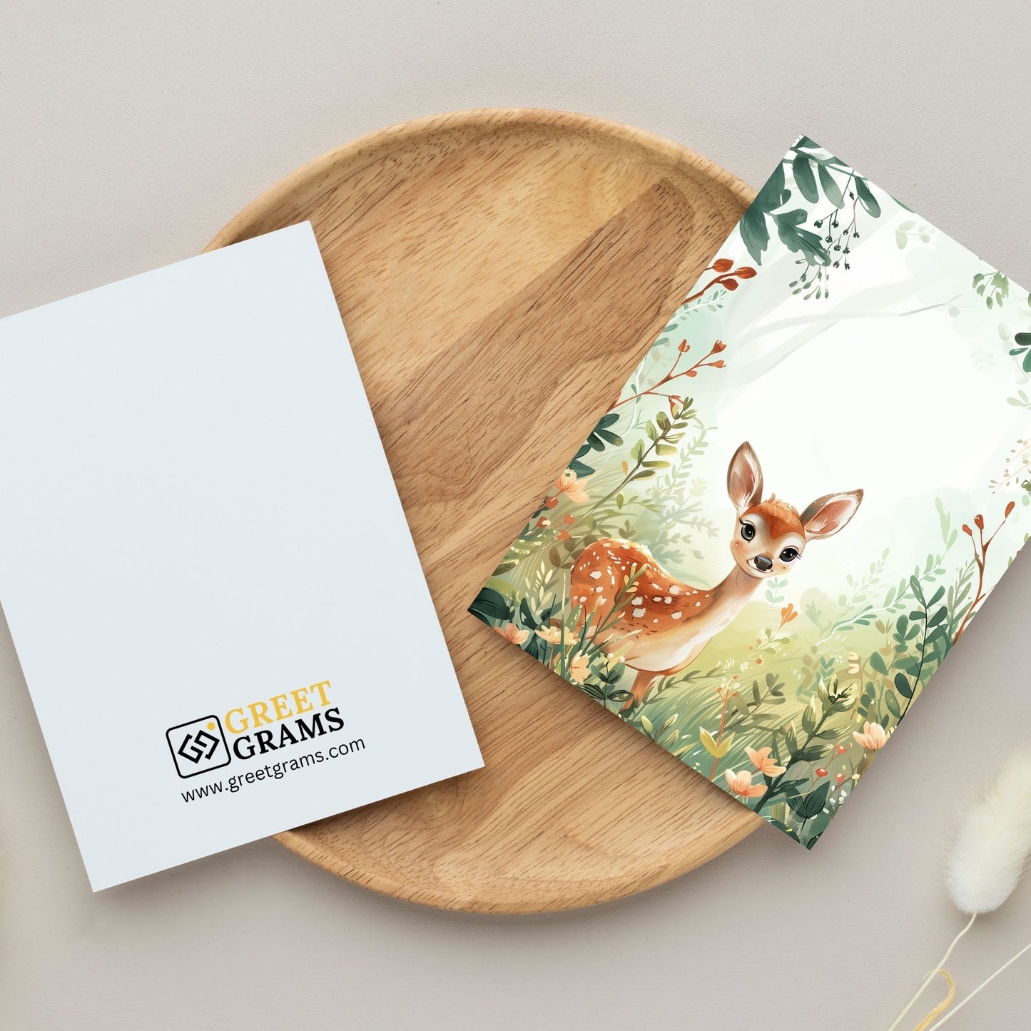 greeting card of a  deer in a beautiful forest with the grey background