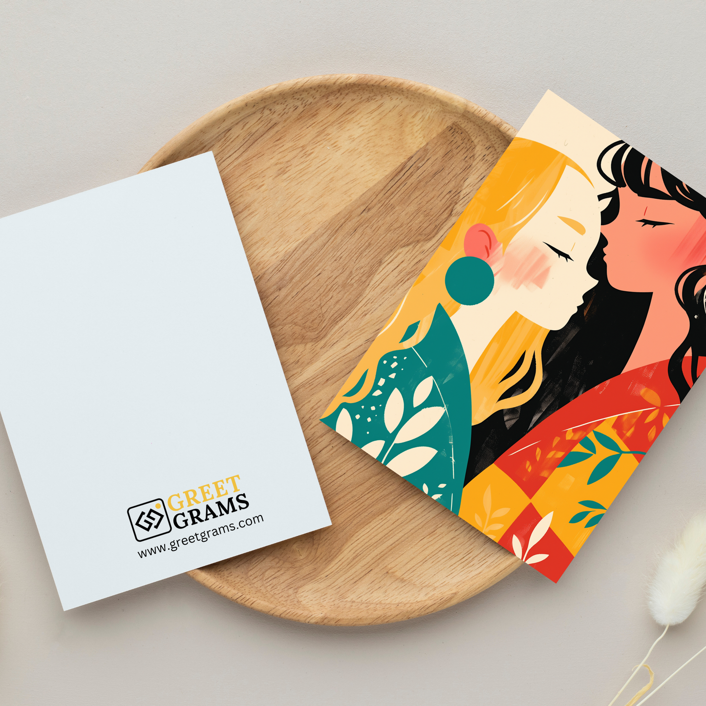 greeting card of female couple embracing in the gray background