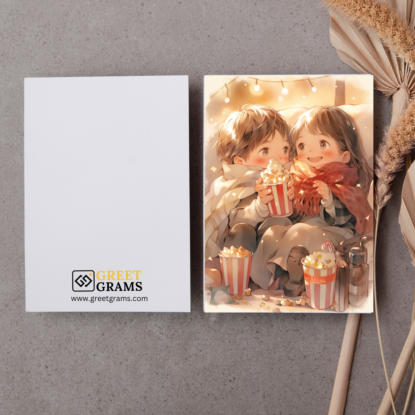 greeting card of two kids enjoying popcorn while celebrating the holiday in the grey background