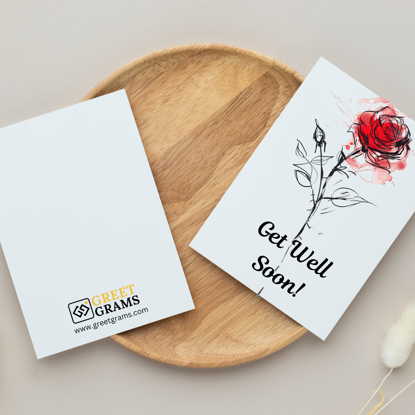 greeting card of a Get Well card with a solitary rose in the grey background