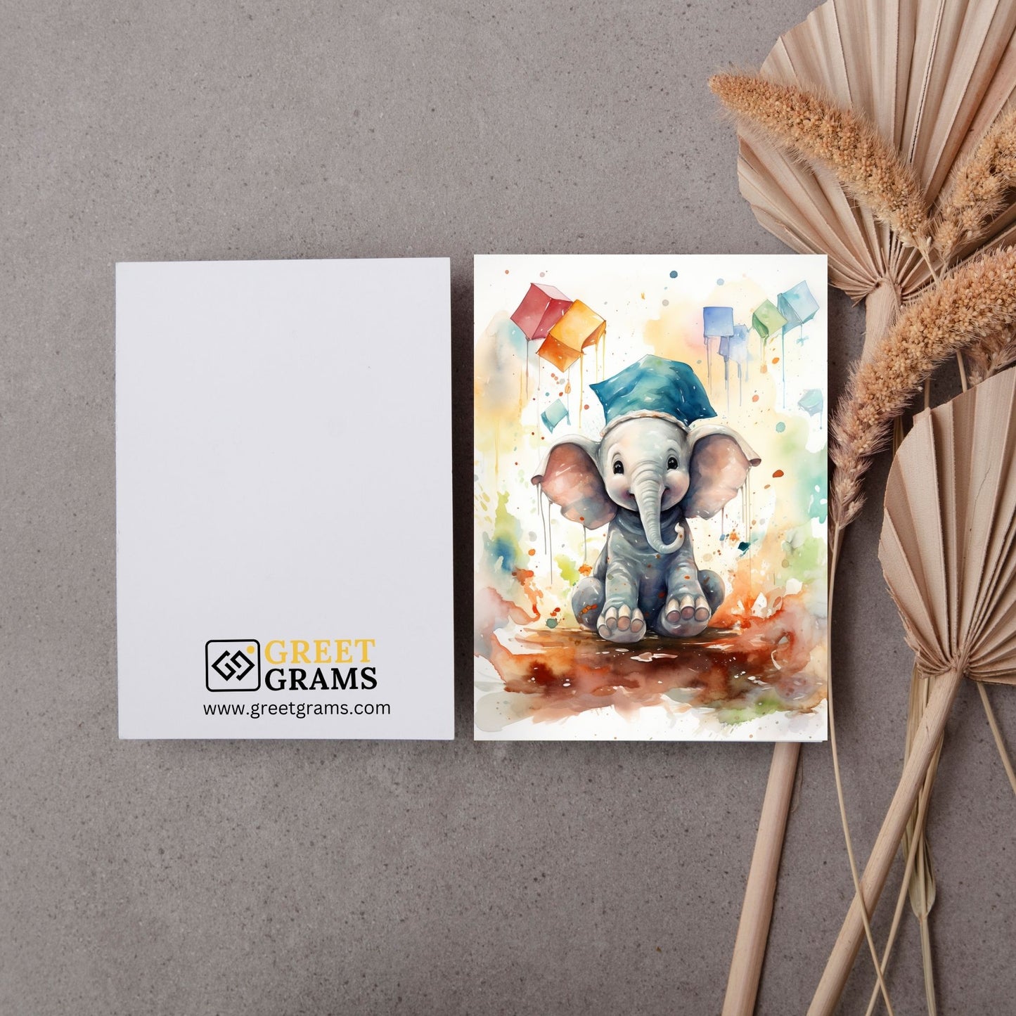 Graduation card showing a happy elephant wearing light blue colour graduation cap