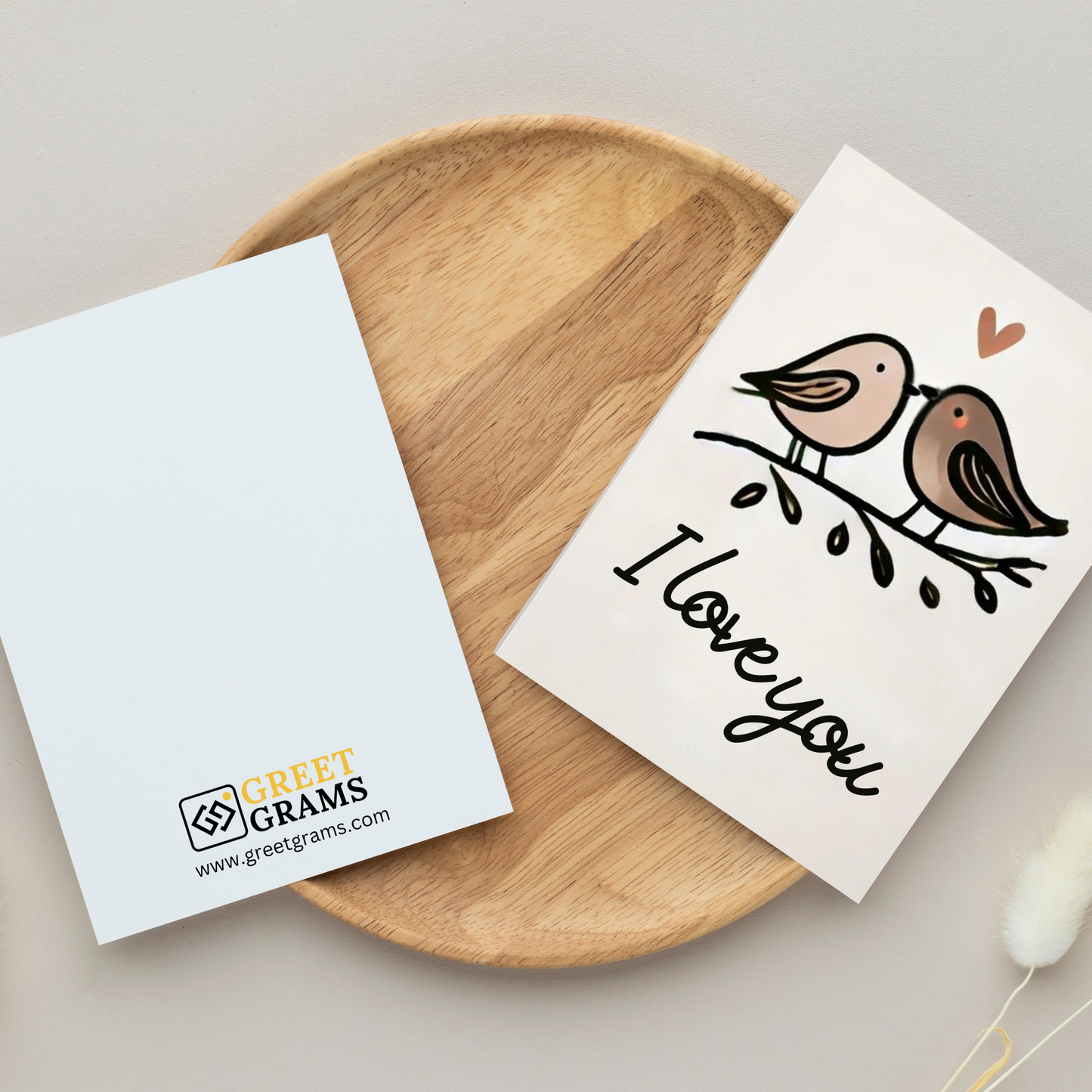 two lovebirds on a branch