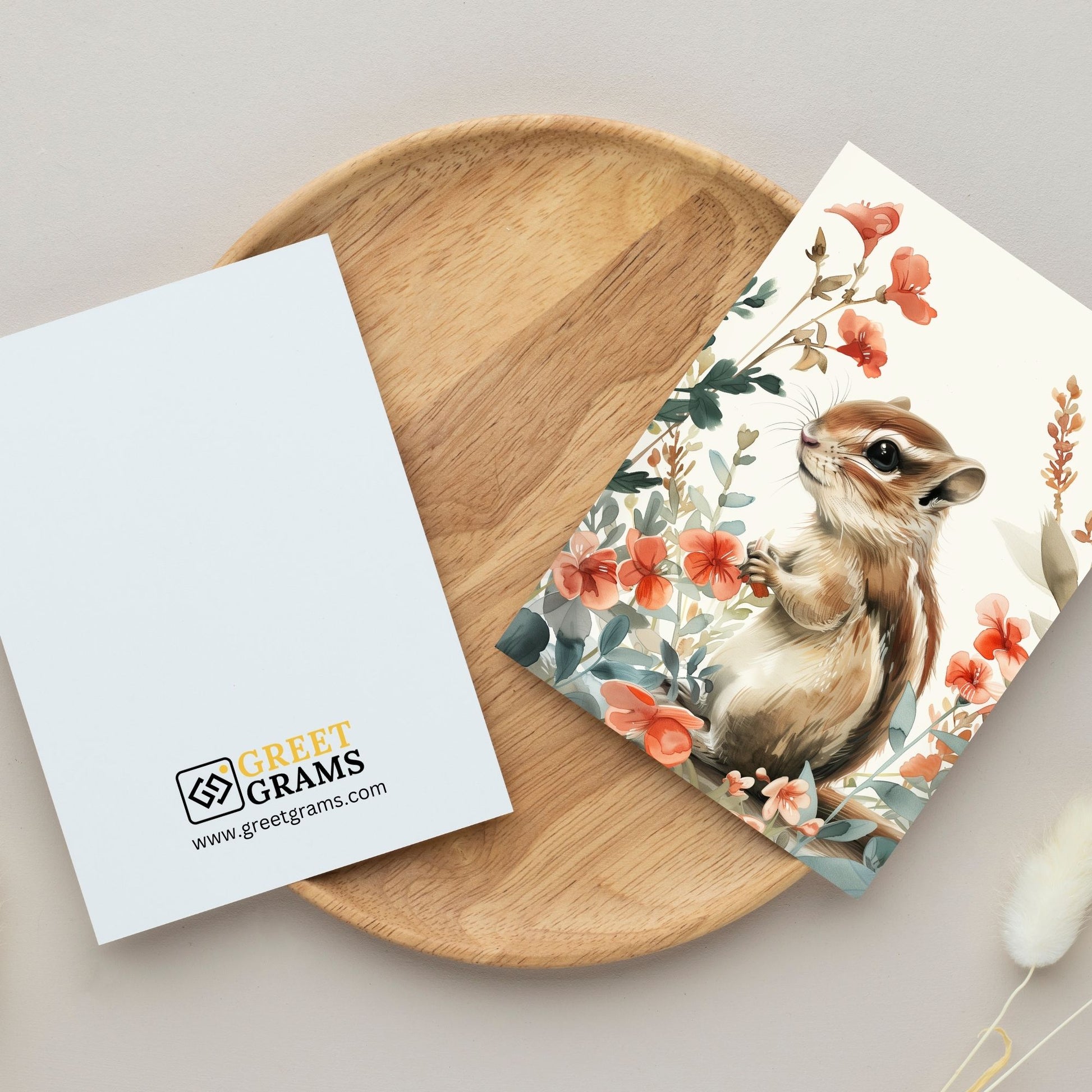 greeting card of a chipmunk exploring the tropical paradise in grey background