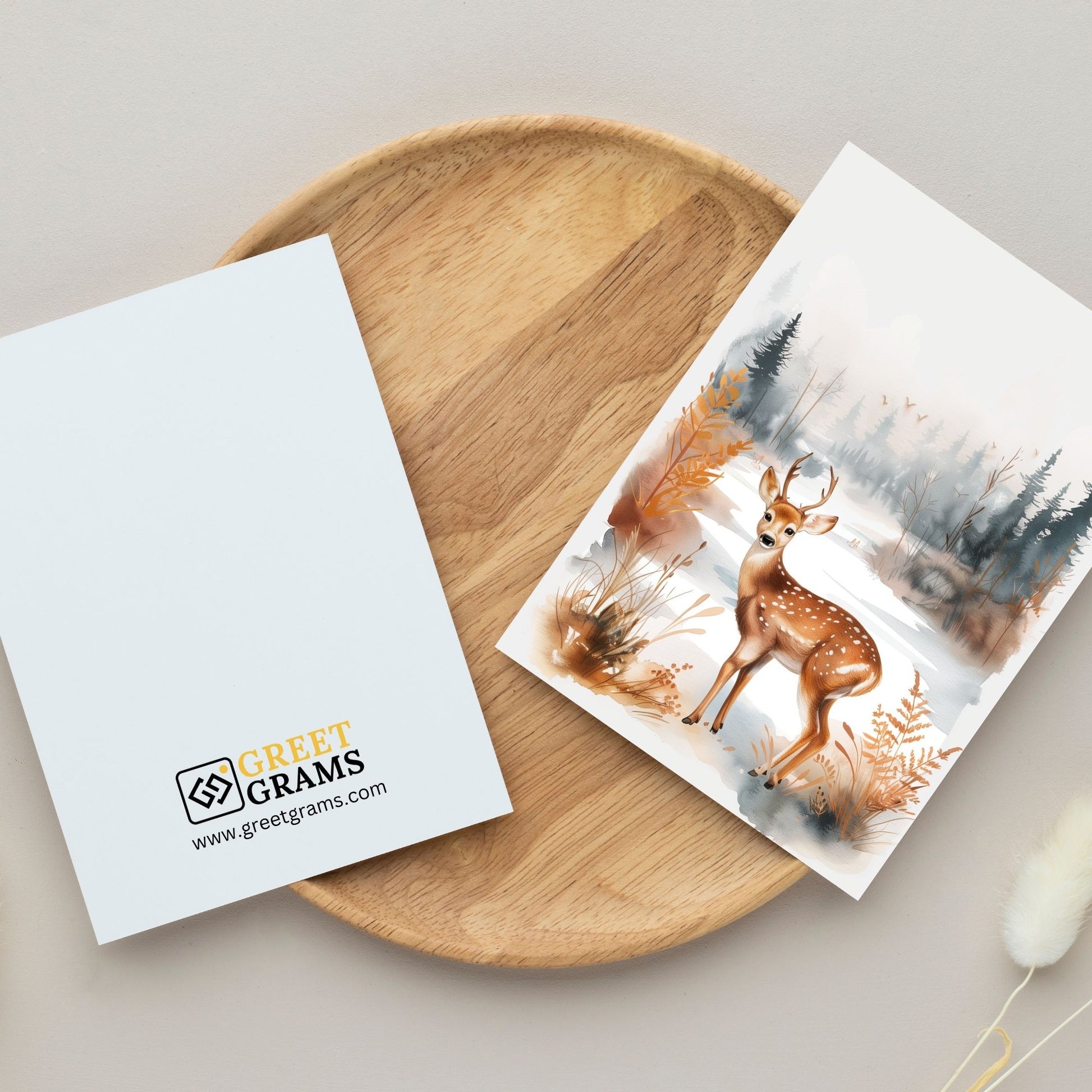 greeting card of a  deer enjoying at seaside  in gray background