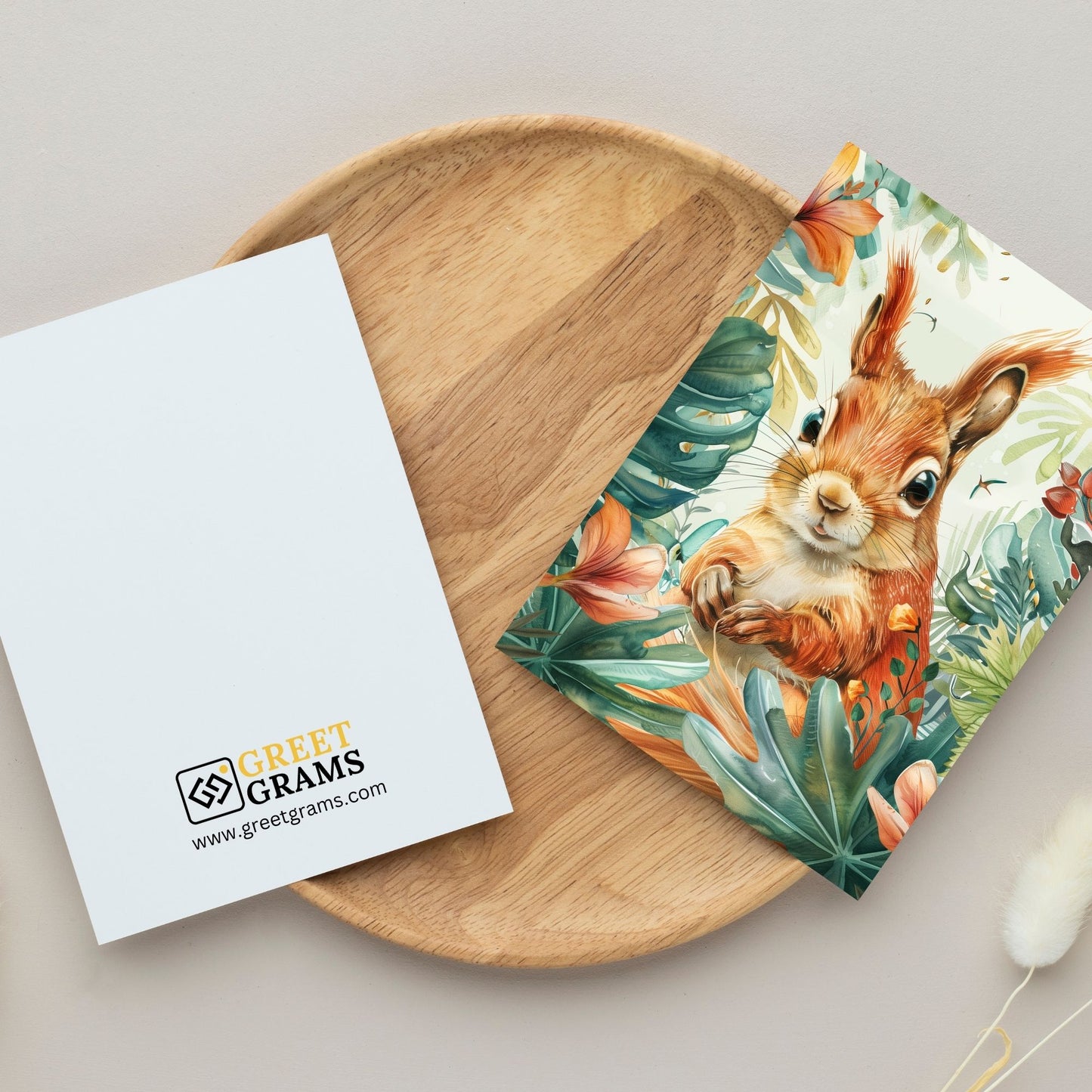 greeting card of a  squirrel reveling in the tropical scenery in the grey background