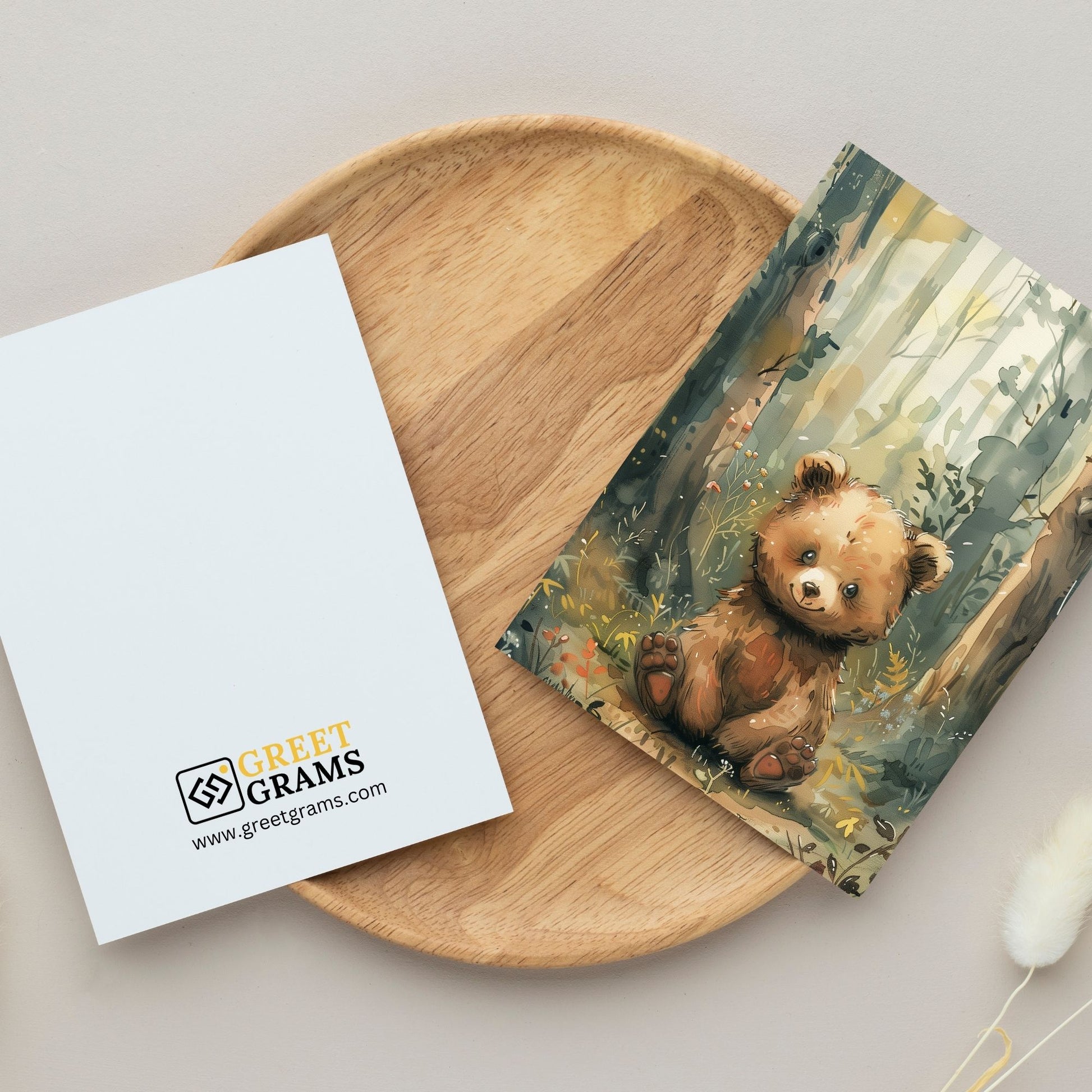 greeting card of a bear enjoying the natural beauty in forest with the gray background