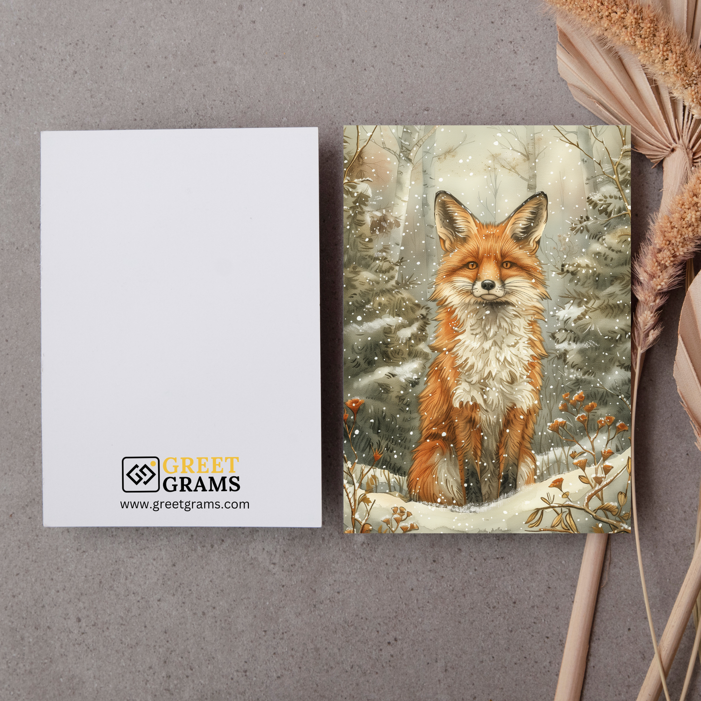 greeting card of a  fox enjoying the winter wonderland in the grey background