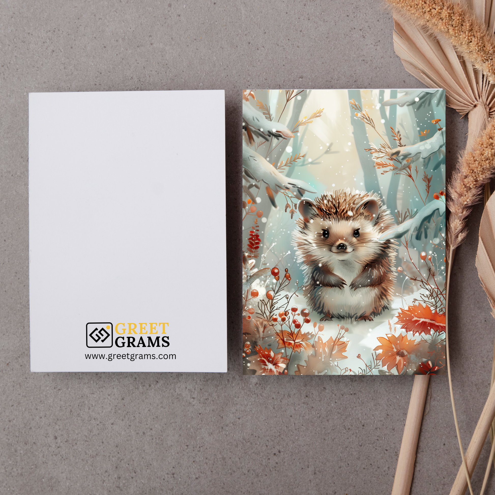 greeting card of a hedgehog enjoying a snowy day in the grey background