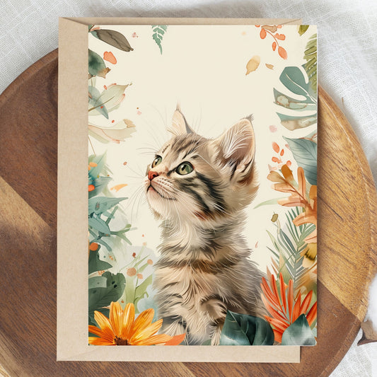 greeting card of a kitten exploring the wonders of a island