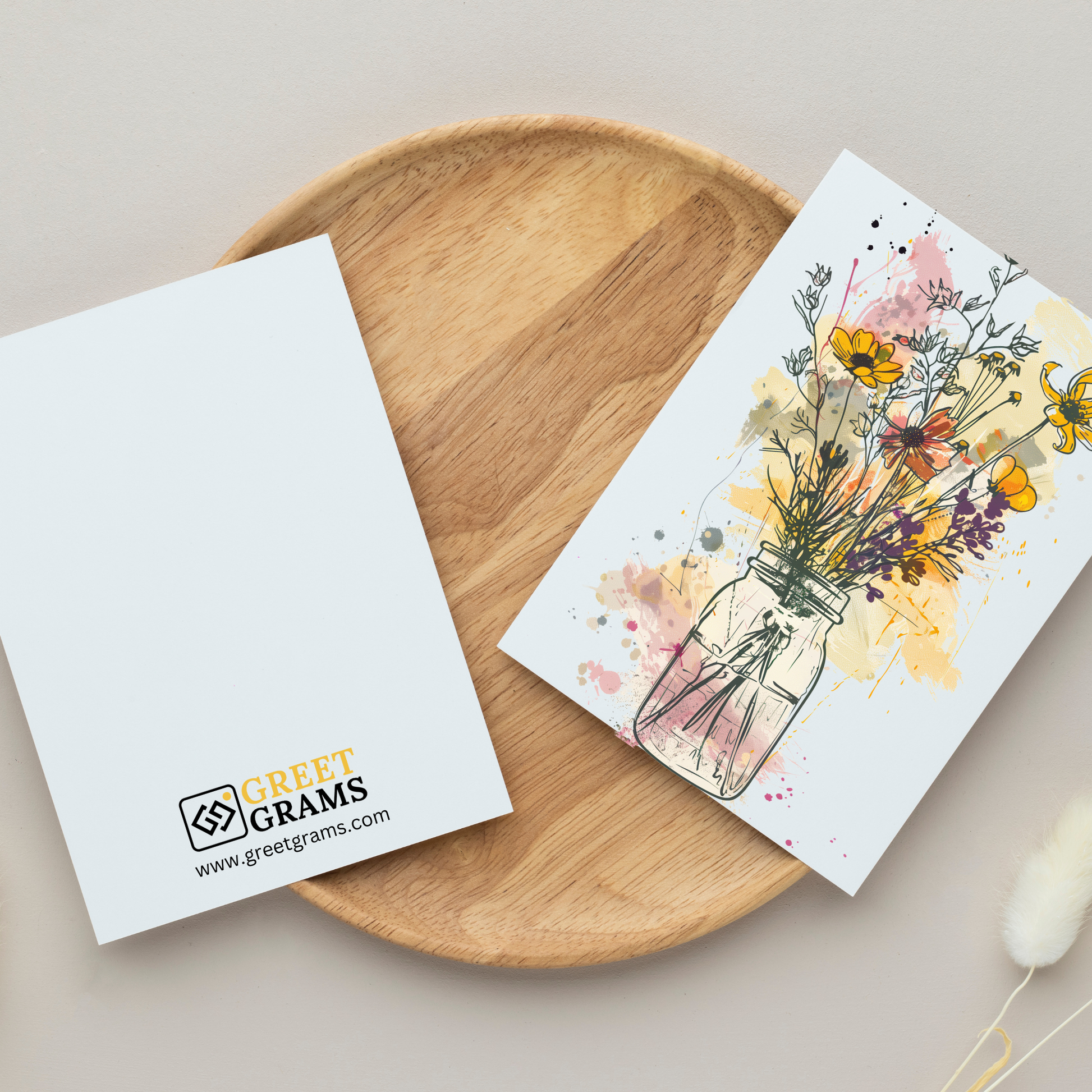 greeting card of a mason jar brimming with colourful blooms in the grey background