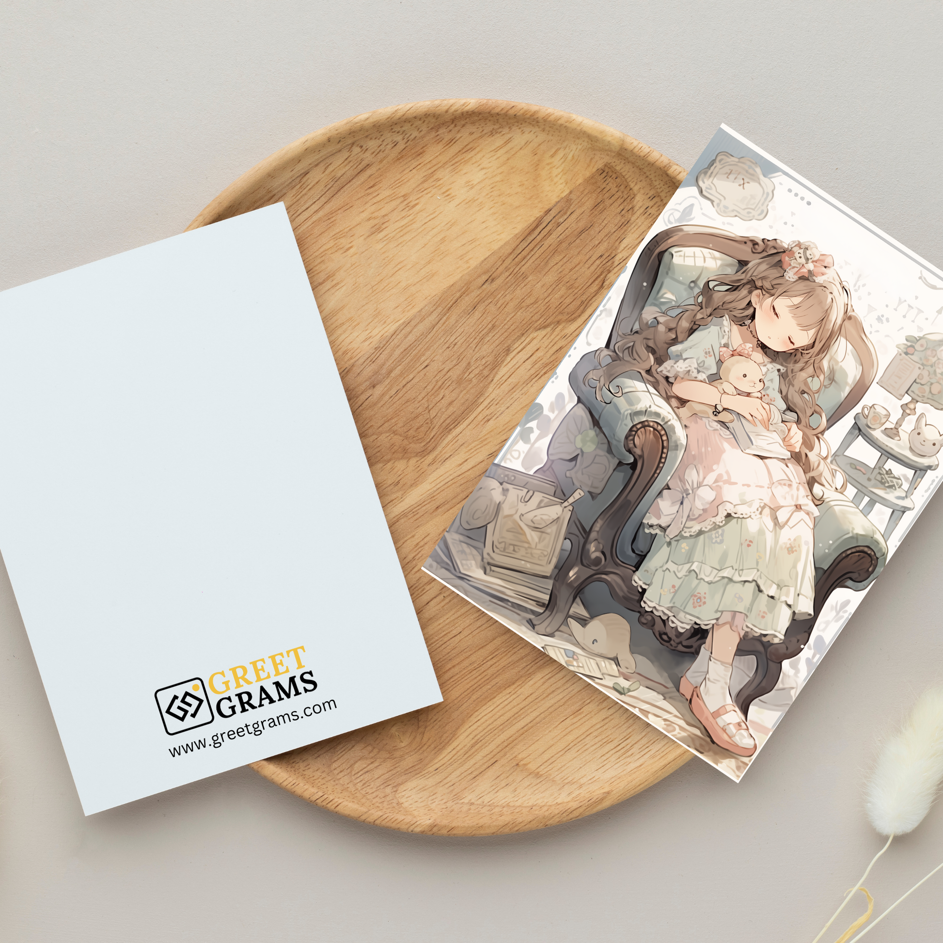 greeting card of a   girl sleeping peacefully in a comfortable setting in the gray backgrond