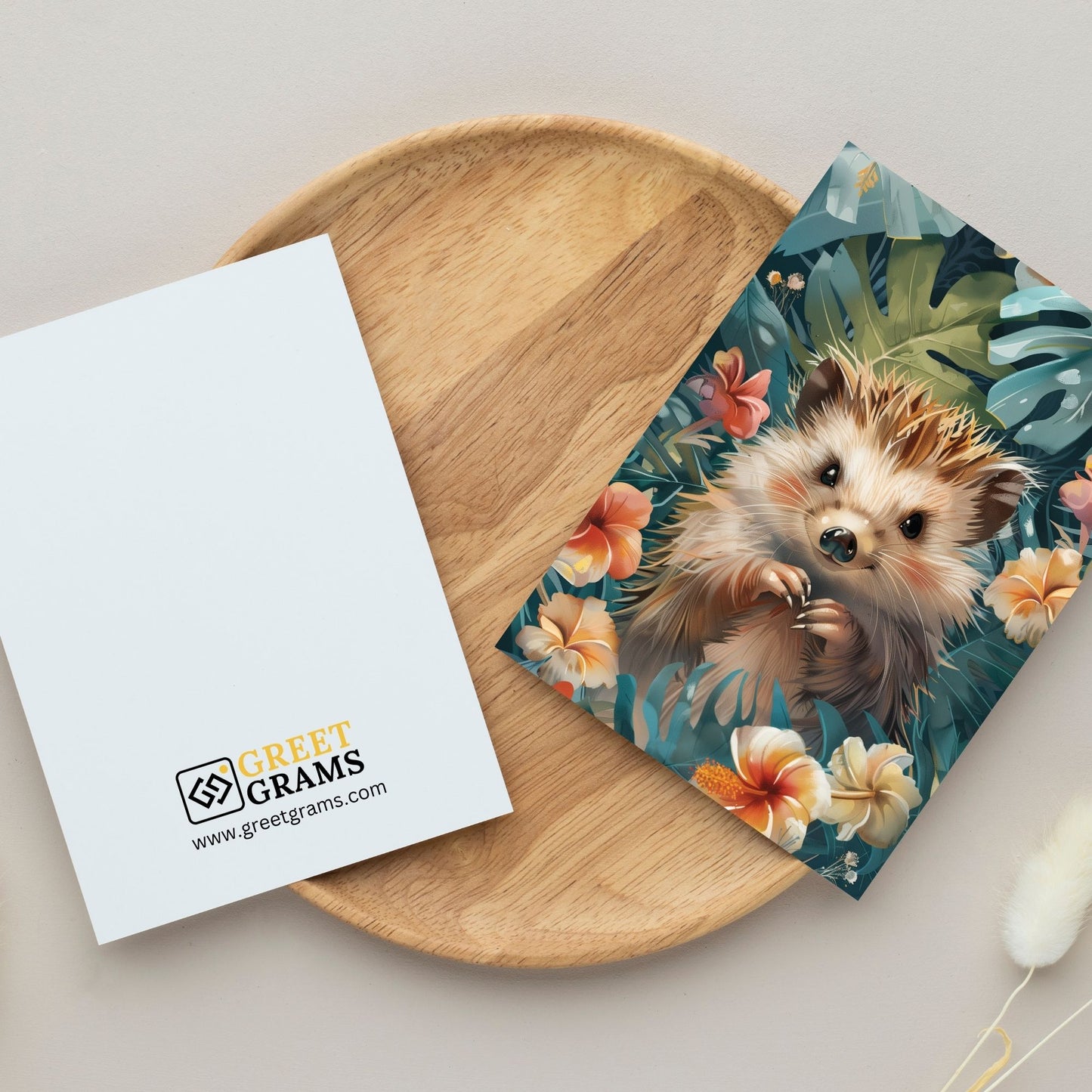 greeting card of a hedgehog enjoying the beauty of a tropical paradise in the grey background