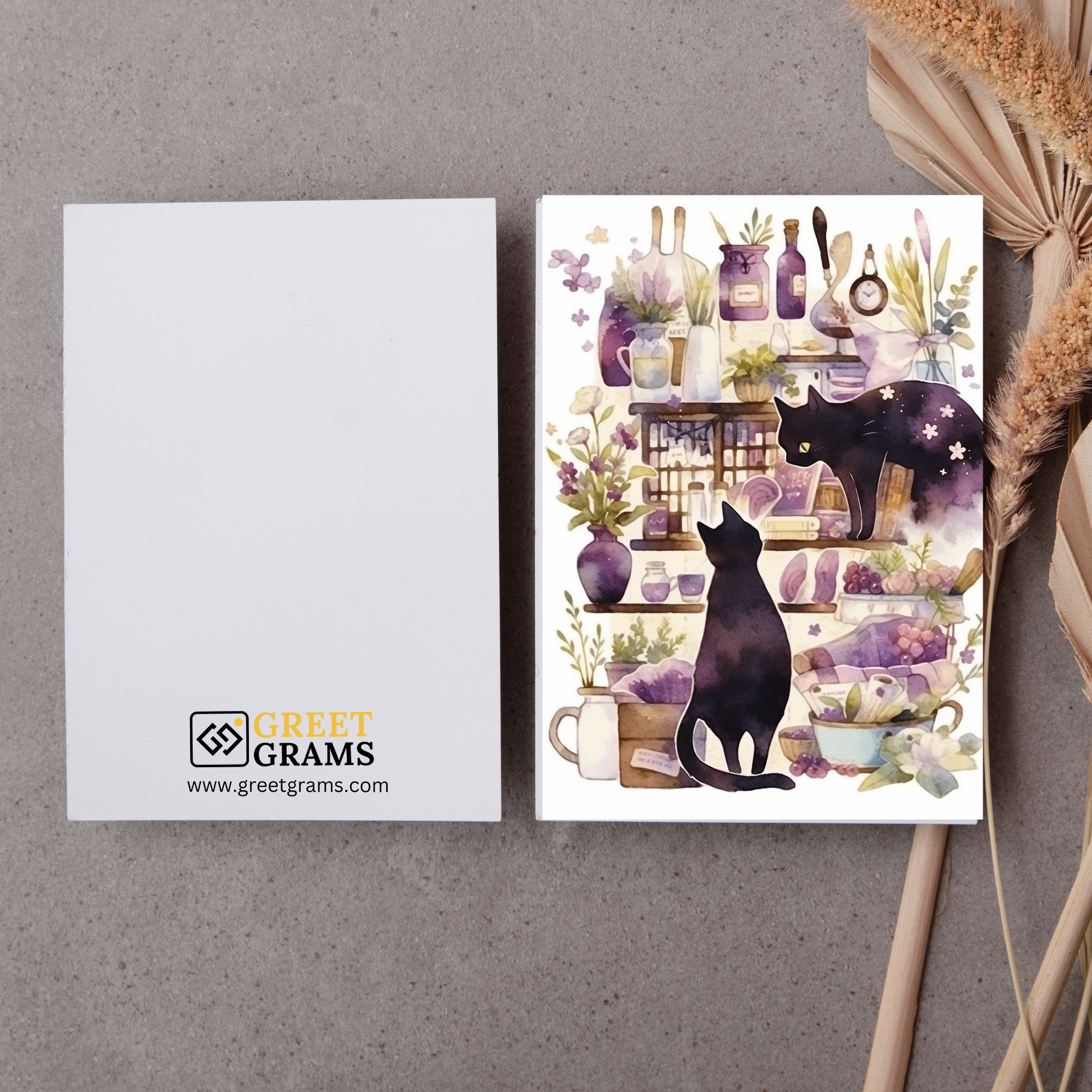 greeting card of cats assisting in spell-making in a witch's lab in the grey background