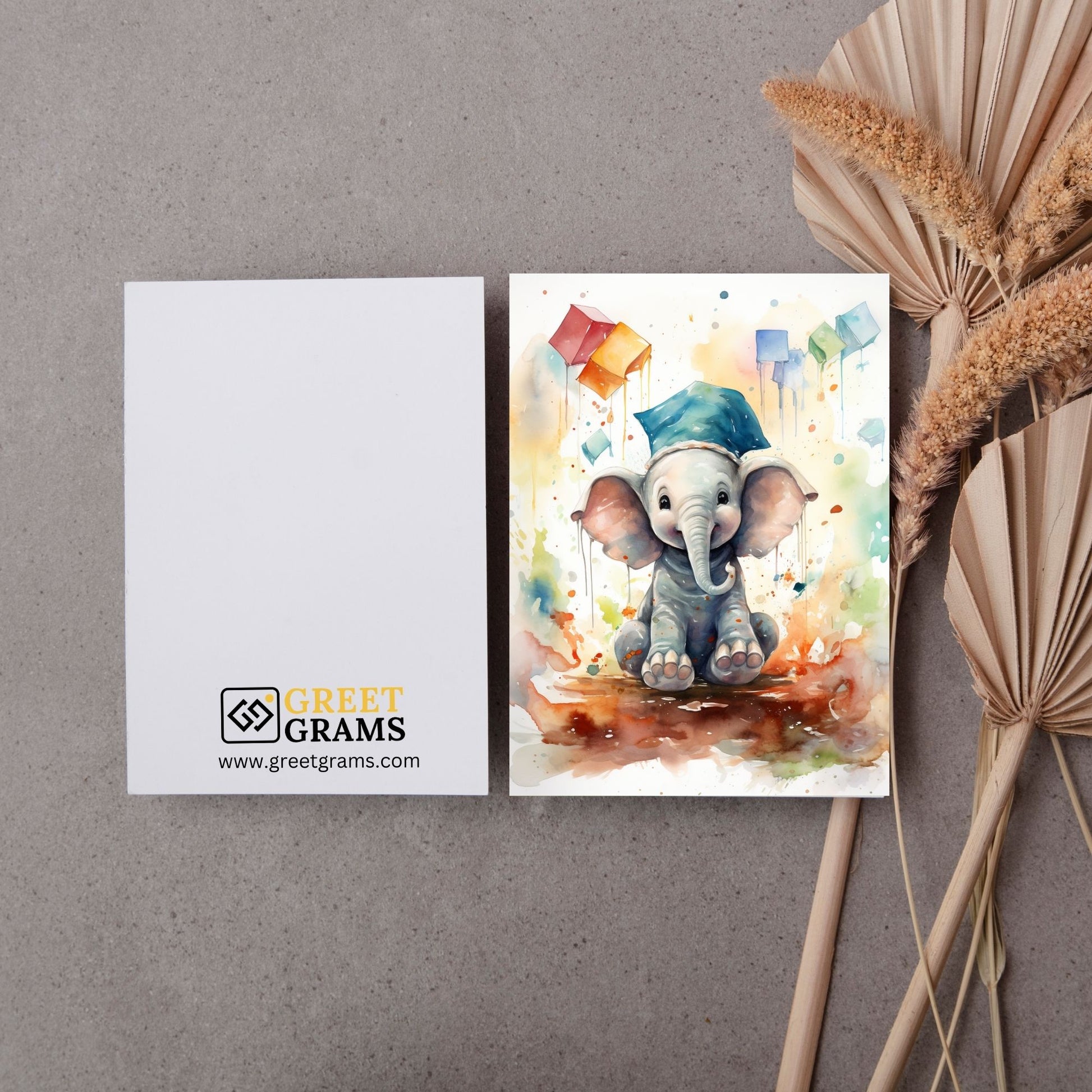 Graduation card showing a happy elephant wearing light blue colour graduation cap 