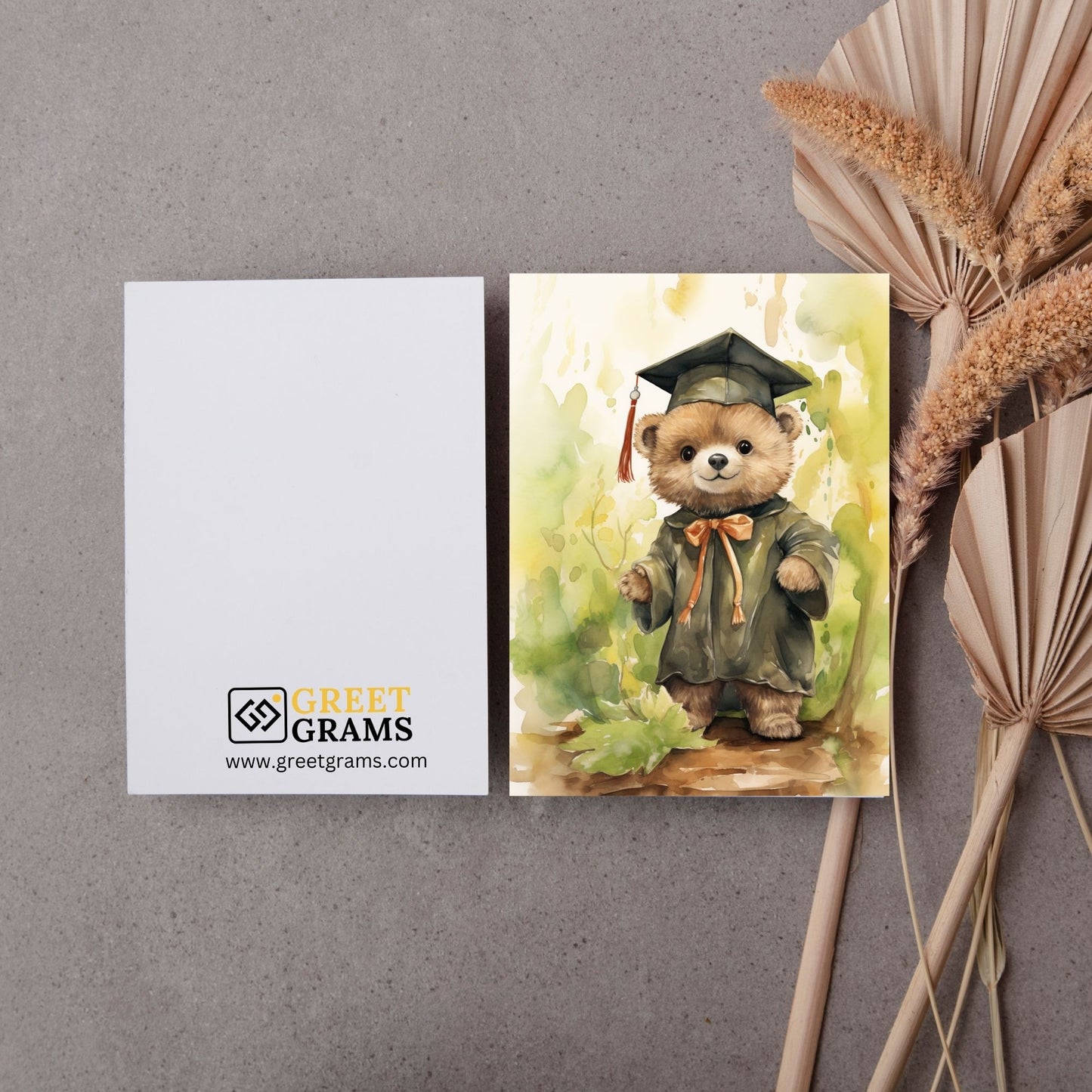 Graduate Card Showing Proud bear wearing green graduation coat and hat 
