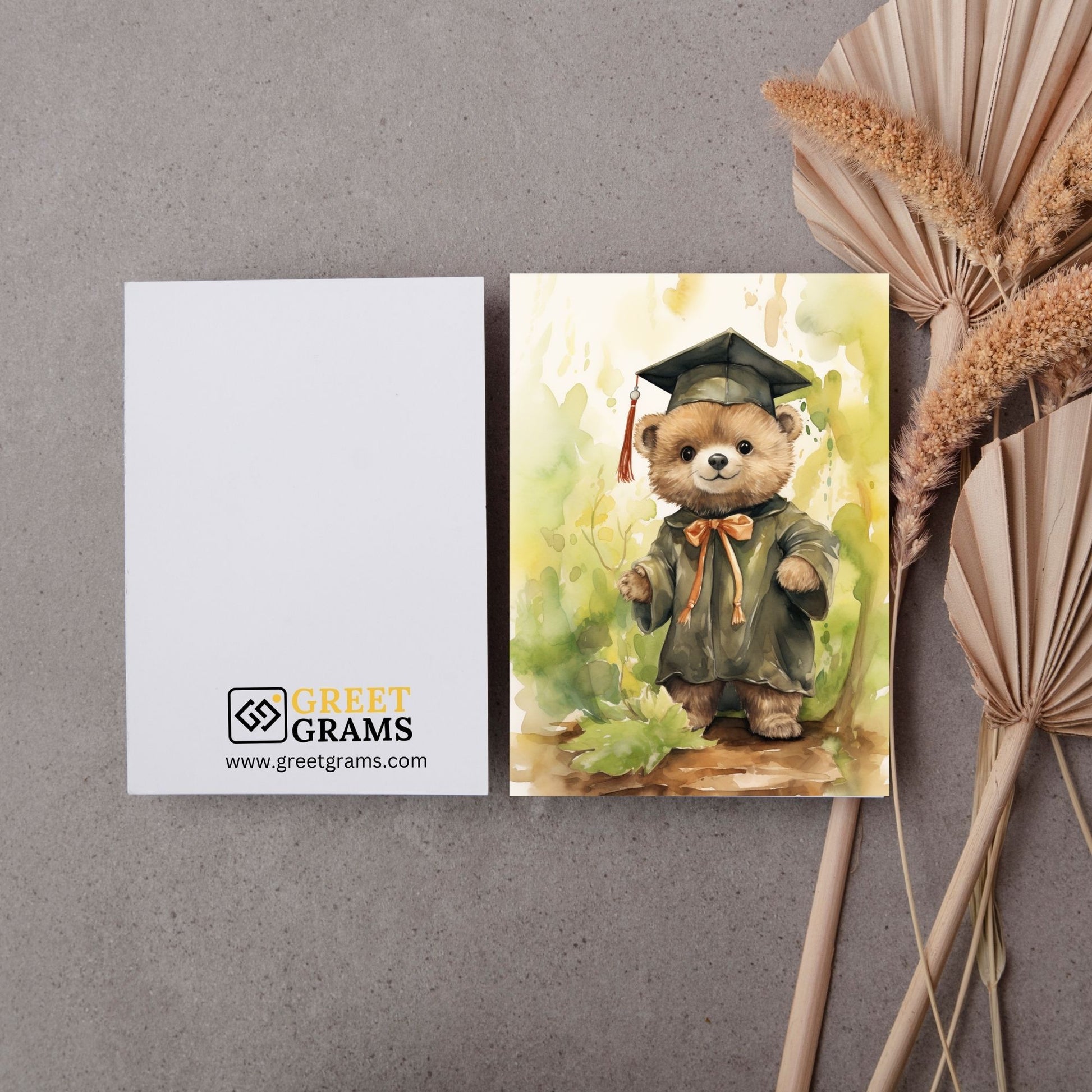 Graduate Card Showing Proud bear wearing green graduation coat and hat 
